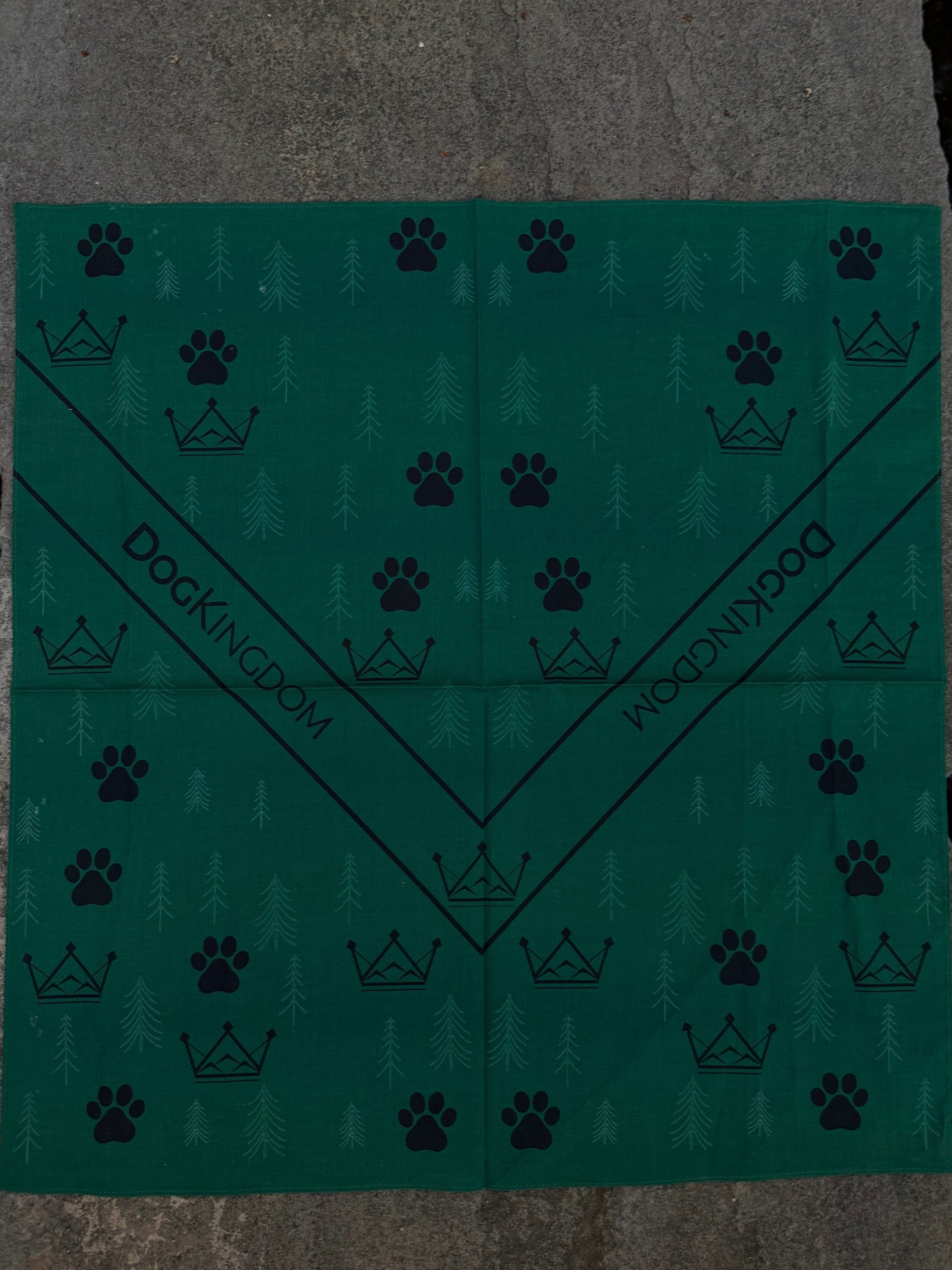 DogKingdom adventure-print bandana in green displayed flat for detail view